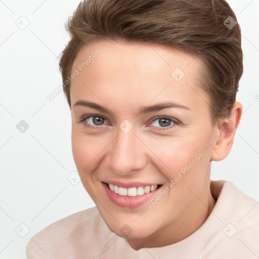 Joyful white young-adult female with short  brown hair and brown eyes