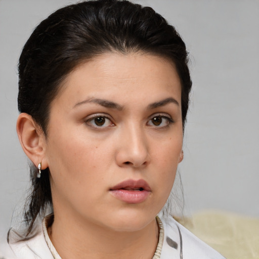 Neutral white young-adult female with medium  brown hair and brown eyes