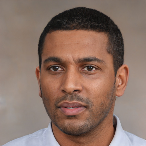 Neutral black young-adult male with short  black hair and brown eyes