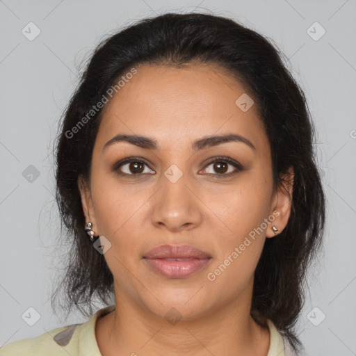 Joyful latino young-adult female with medium  brown hair and brown eyes