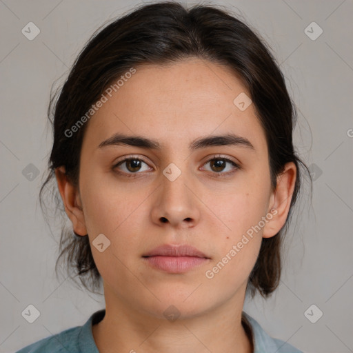 Neutral white young-adult female with medium  brown hair and brown eyes