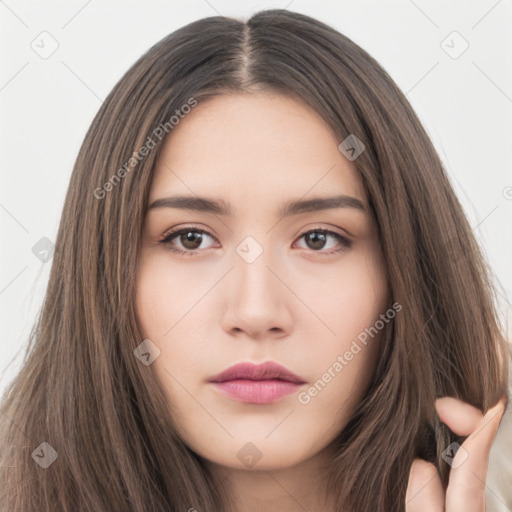 Neutral white young-adult female with long  brown hair and brown eyes