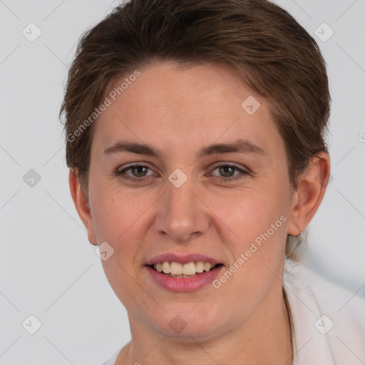 Joyful white young-adult female with short  brown hair and grey eyes