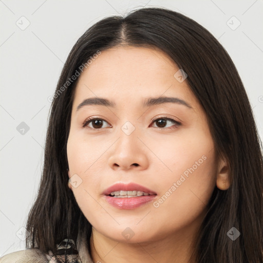 Joyful asian young-adult female with long  brown hair and brown eyes