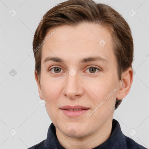 Joyful white young-adult female with short  brown hair and grey eyes