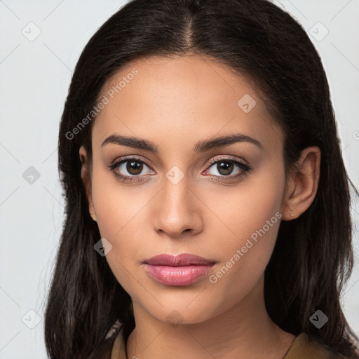 Joyful latino young-adult female with long  brown hair and brown eyes