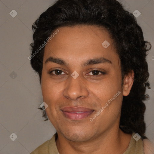 Joyful latino adult female with short  brown hair and brown eyes