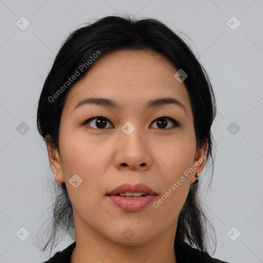 Joyful asian young-adult female with medium  black hair and brown eyes