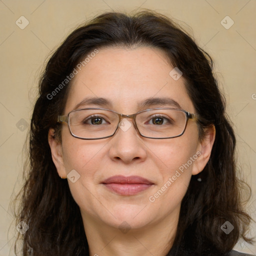 Joyful white adult female with long  brown hair and brown eyes