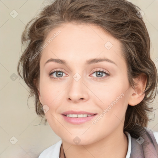 Joyful white young-adult female with medium  brown hair and blue eyes