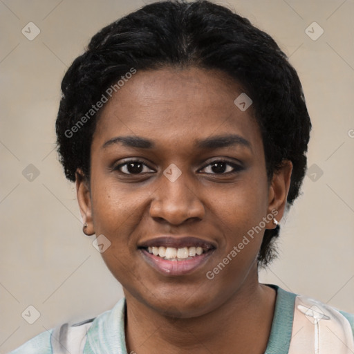 Joyful black young-adult female with short  black hair and brown eyes