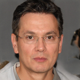 Neutral white middle-aged male with short  brown hair and brown eyes