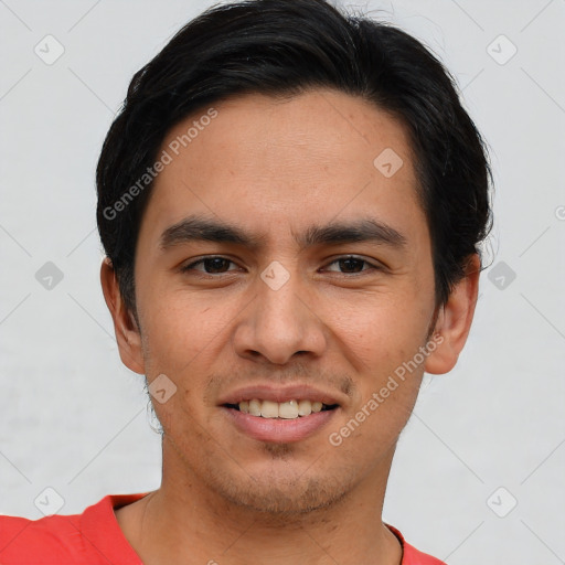 Joyful asian young-adult male with short  brown hair and brown eyes