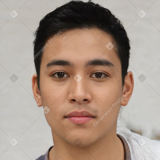 Neutral latino young-adult male with short  black hair and brown eyes
