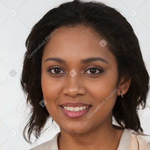 Joyful black young-adult female with medium  brown hair and brown eyes