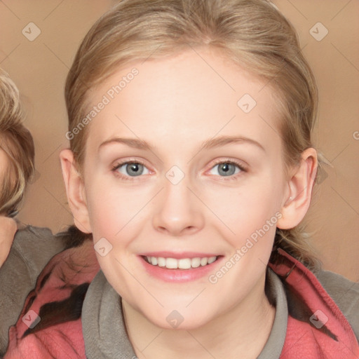 Joyful white young-adult female with medium  brown hair and blue eyes