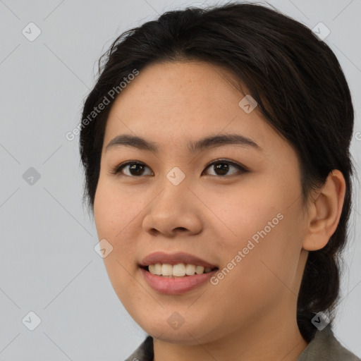 Joyful asian young-adult female with medium  brown hair and brown eyes