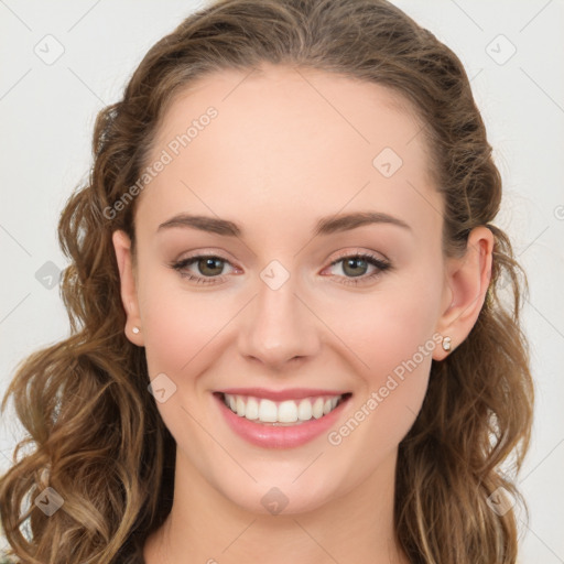 Joyful white young-adult female with long  brown hair and green eyes