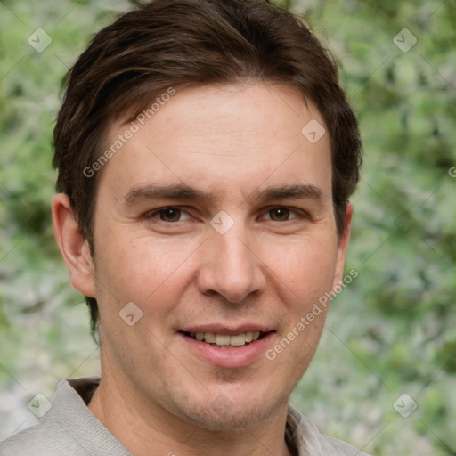 Joyful white adult male with short  brown hair and grey eyes