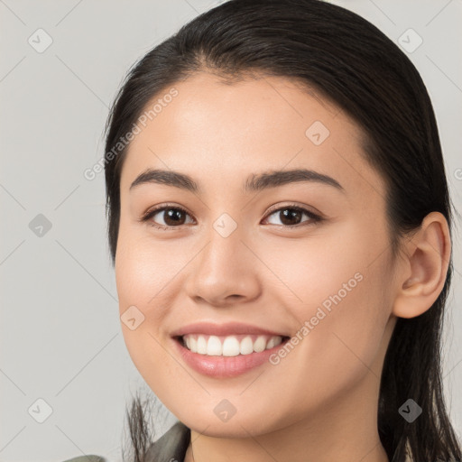 Joyful white young-adult female with long  brown hair and brown eyes