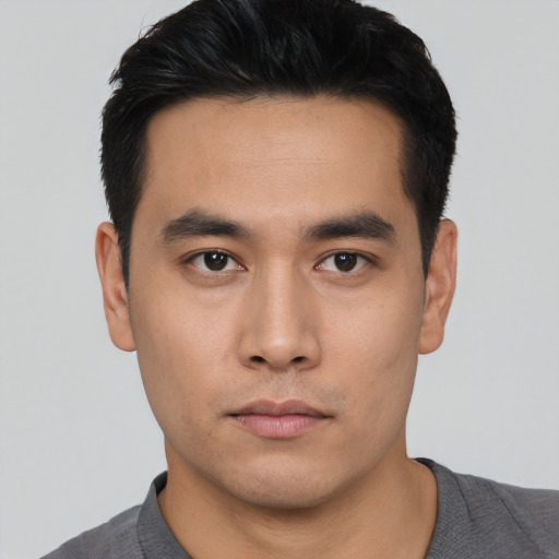 Neutral asian young-adult male with short  black hair and brown eyes