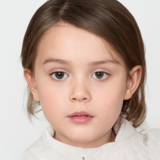 Neutral white child female with medium  brown hair and brown eyes