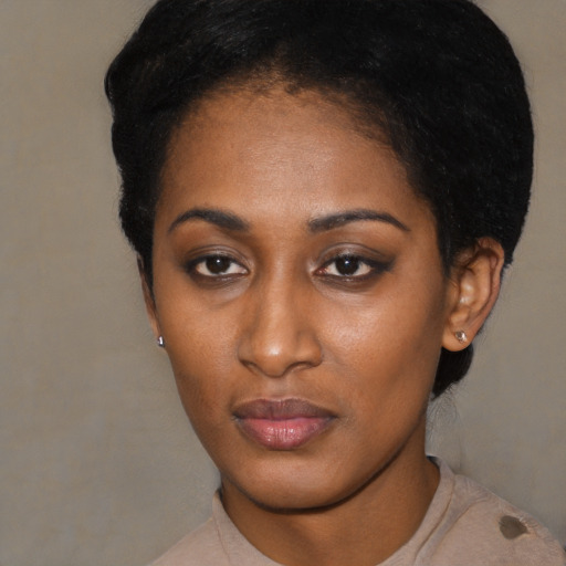 Neutral black young-adult female with short  black hair and brown eyes