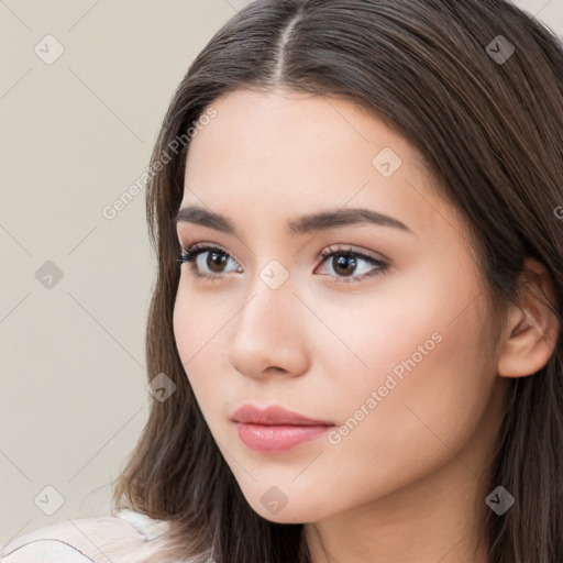 Neutral white young-adult female with long  brown hair and brown eyes