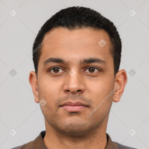Neutral latino young-adult male with short  black hair and brown eyes