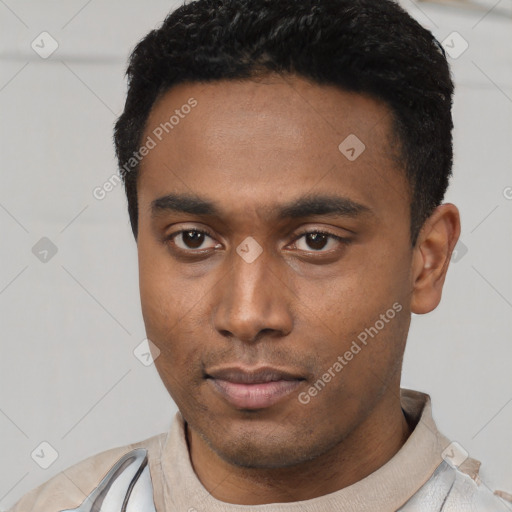 Neutral latino young-adult male with short  black hair and brown eyes