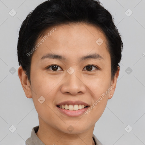 Joyful asian young-adult male with short  brown hair and brown eyes