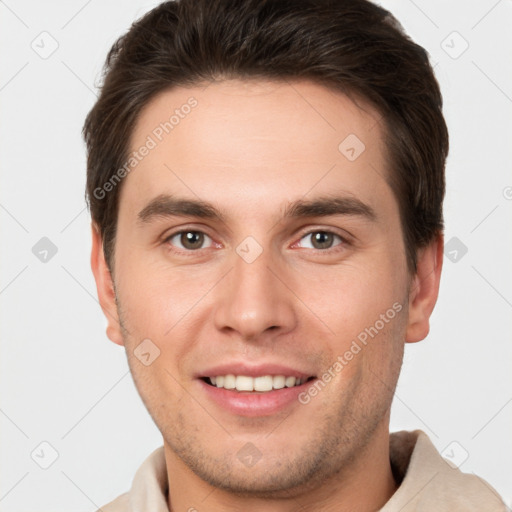 Joyful white young-adult male with short  brown hair and brown eyes