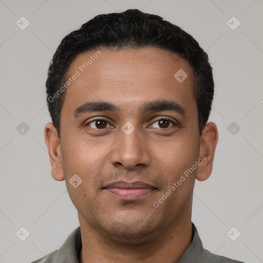 Neutral latino young-adult male with short  black hair and brown eyes