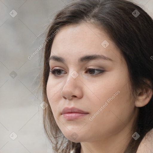 Neutral white young-adult female with long  brown hair and brown eyes