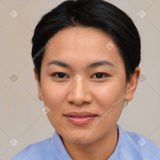 Joyful asian young-adult female with short  black hair and brown eyes