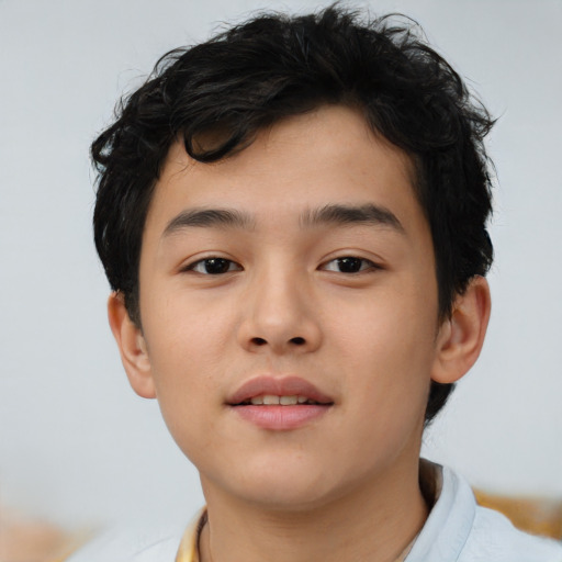 Neutral asian child male with short  brown hair and brown eyes