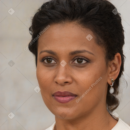 Joyful black young-adult female with medium  brown hair and brown eyes