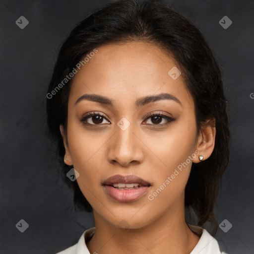 Joyful latino young-adult female with long  brown hair and brown eyes