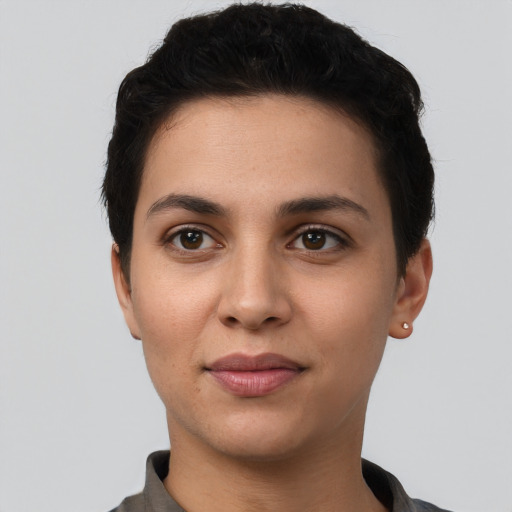 Joyful white young-adult female with short  black hair and brown eyes