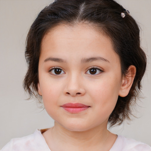 Joyful white child female with medium  brown hair and brown eyes