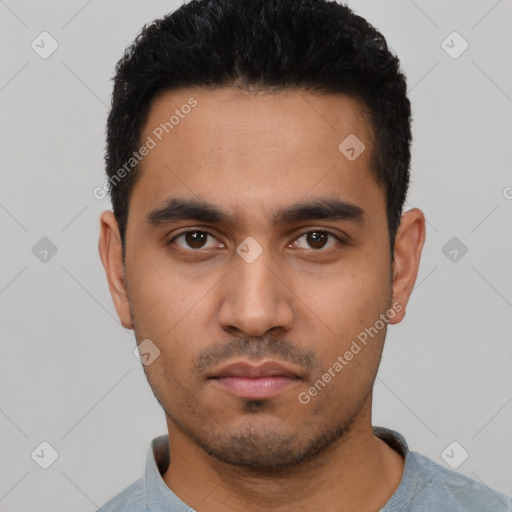 Neutral latino young-adult male with short  black hair and brown eyes