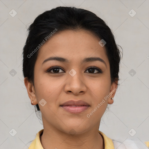 Joyful latino young-adult female with short  brown hair and brown eyes