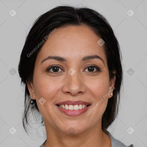 Joyful white adult female with medium  brown hair and brown eyes