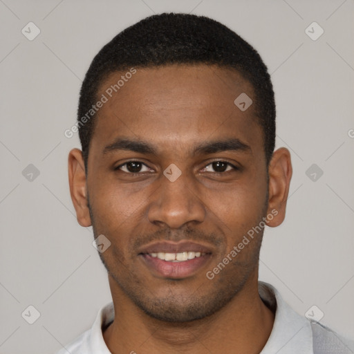 Joyful black young-adult male with short  black hair and brown eyes