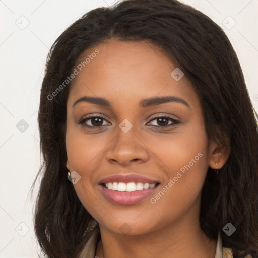 Joyful latino young-adult female with long  brown hair and brown eyes