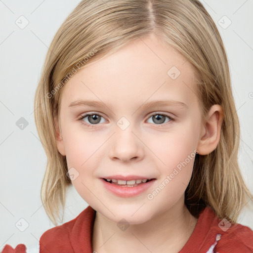 Joyful white child female with medium  brown hair and blue eyes