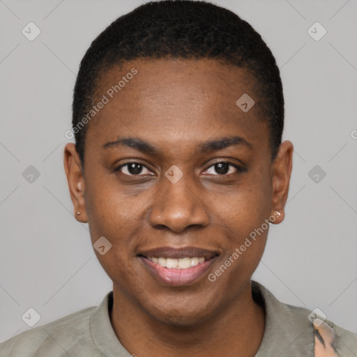 Joyful black young-adult male with short  black hair and brown eyes