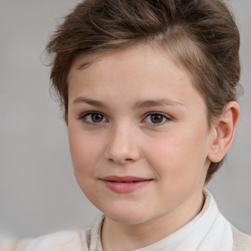 Joyful white child female with short  brown hair and brown eyes