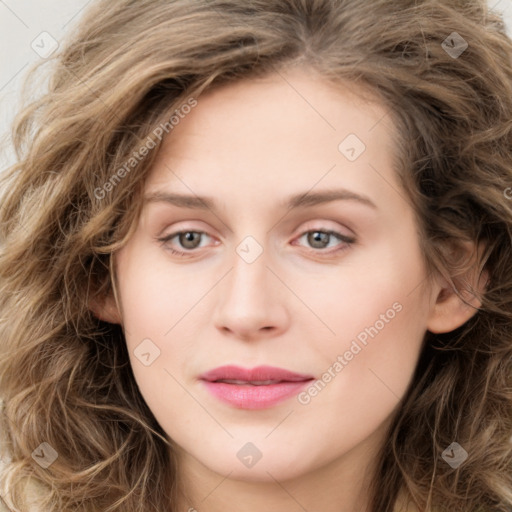 Joyful white young-adult female with long  brown hair and green eyes