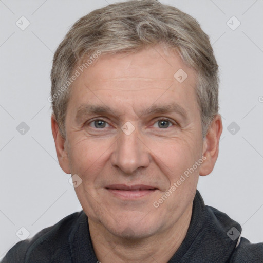 Joyful white adult male with short  brown hair and grey eyes